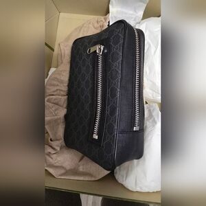 Gucci sling backpack
